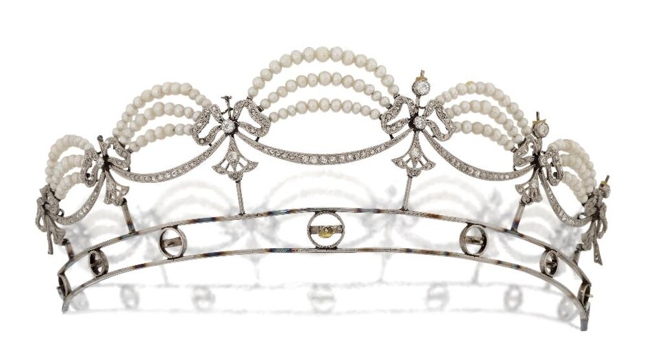 A Belle Epoque diamond and pearl diadem, some fittings deficient, the main fixed section designed as six old-brilliant and rose-cut diamond ribbon bow clusters with rose diamond and graduated pearl triple-row swags (terminals have been cut) the...