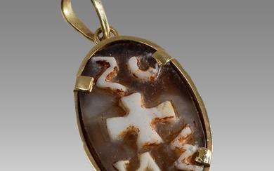 A Byzantine Style Cameo with Cross and inscription, set in gold pendant.