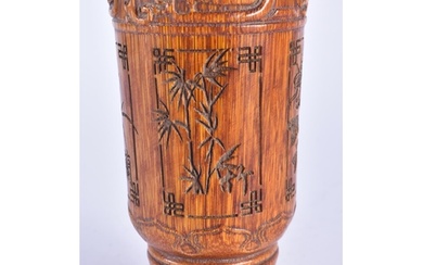 A CHINESE CARVED BUFFALO HORN TYPE BEAKER VASE 20th Century....