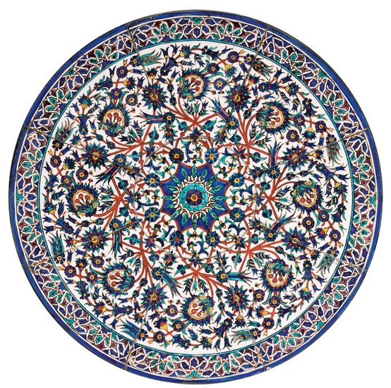 A COFFEE TABLE MOUNTED WITH KUTAHYA POTTERY TILES, TURKEY, LATE 19TH CENTURY, WITH MODERN FRAME