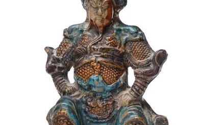 SOLD. A Chinese Ming 1368-1644 sancai-glazed fired clay guardian. H. 23.5 cm. – Bruun Rasmussen Auctioneers of Fine Art
