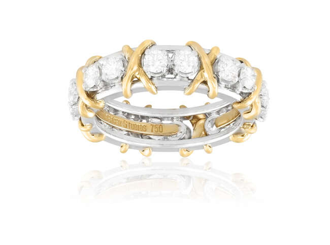 A DIAMOND ETERNITY RING, BY SCHLUMBERGER FOR TIFFANY...