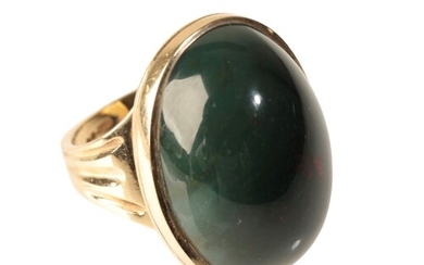 A LARGE BLOOD STONE DRESS RING the oval-cut cabochon stone, ...