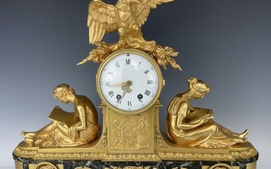 A LARGE EMPIRE STYLE DORE BRONZE AND MARBLE CLOCK