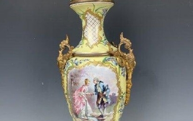A LARGE ORMOLU MOUNTED SEVRES VASE AND COVER