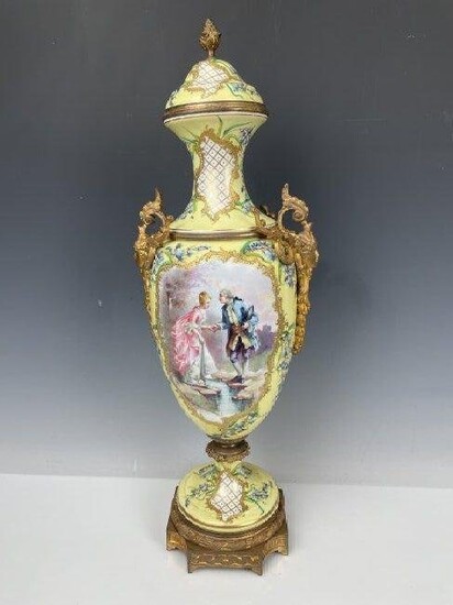 A LARGE ORMOLU MOUNTED SEVRES VASE AND COVER