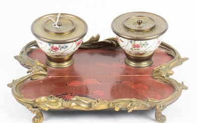 A Louis XV style gilt bronze mounted lacquer and porcelain encrier