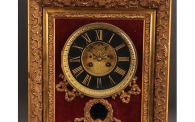 A Louis XV style giltwood and gesso wall clock, incorporatin...