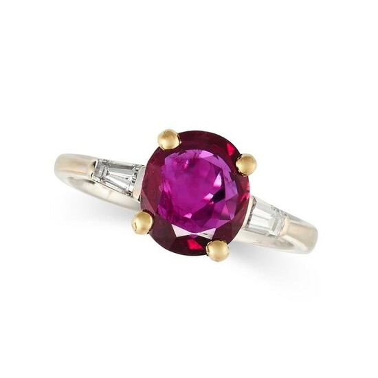 A RUBY AND DIAMOND THREE STONE RING set with a cushion