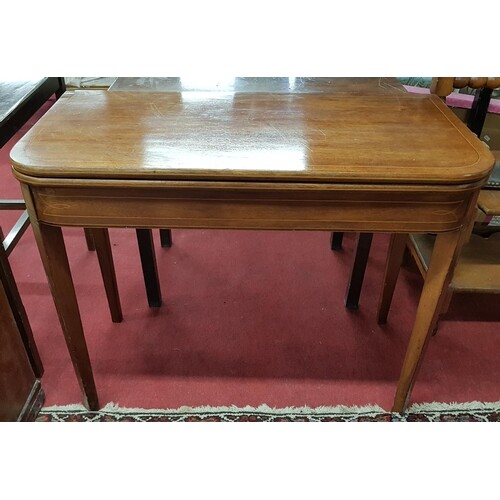 A Regency Mahogany Foldover Tea Table with boxwood inlay on ...