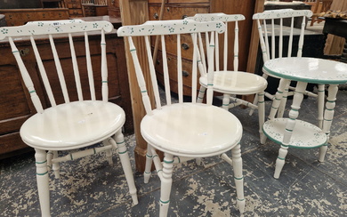 A SET OF FOUR WHITE PAINTED YOKE BACKED KITCHEN CHAIRS DETAILED IN TURQUOISE AND ENSUITE WITH A