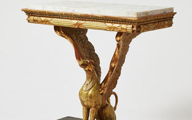 A STOCKHOLM-QUALITY EMPIRE CONSOLE TABLE, first quarter of the 19th century, woodcut decor and pastellage, made of older gilding with polished gold and hammered metal.