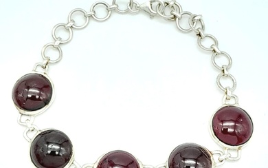 A Sterling Silver Red Stone Cabochon Set Bracelet. 19cm...