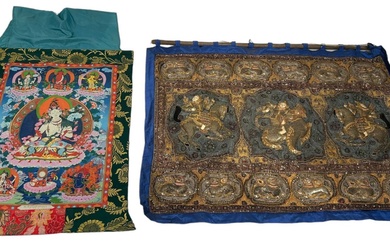 A TIBETAN THANGKA ALONG WITH AN EMBROIDERED WALL HANGING...