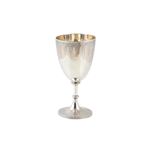A VICTORIAN SILVER CHALICE, with bright cut and chased engra...