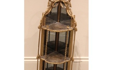 A Victorian giltwood and gesso mirrored corner wall shelf, t...