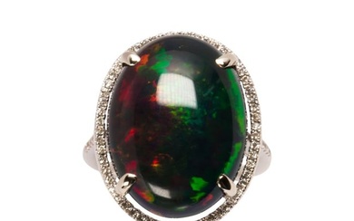 A black opal, diamond and 14k white gold ring