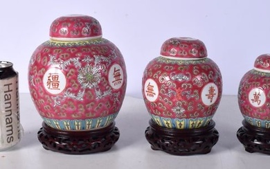 A collection of Chinese porcelain Ginger jars with hardwood stands 15 cm (3).