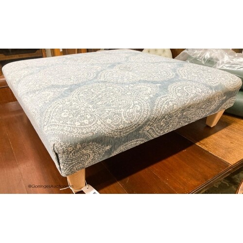 A contemporary foot stool, in Colefax Fowler upholstery, len...