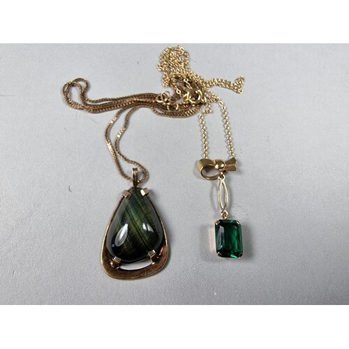 A gold mounted gemset pendant and a 9ct gold emerald glass p...