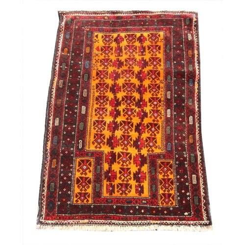 A hand woven full pile Afghan Baluchi Nomadic prayer rug, wi...