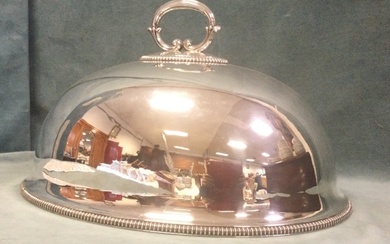 A late Victorian oval domed silver plated food cover with...