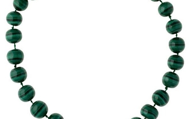 A malachite bead necklace, composed of twenty-nine graduated beads to gilt-metal clasp, length 59cm