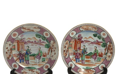 A pair of Chinese export porcelain plates, decorated in colours with a...