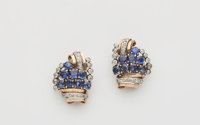 A pair of Retro Style 14k red gold diamond and sapphire clip earrings.