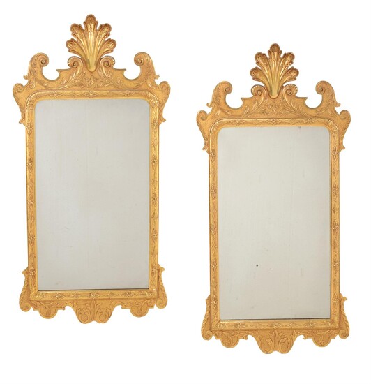 A pair of giltwood wall mirrors in mid 18th century style
