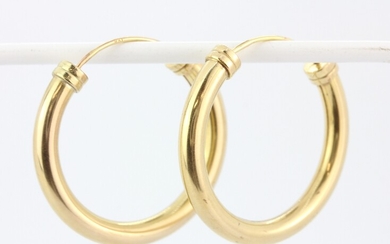 A pair of hallmarked 9ct yellow gold hoop earrings, dia. 3cm.