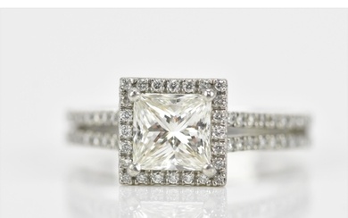A platinum diamond solitaire ring, with princess cut stone w...