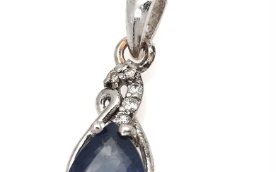 SOLD. A sapphire and diamond pendant set with a sapphire weighing app. 1.26 ct. and five diamonds, mounted in 14k white gold. L. app. 2.3 cm. – Bruun Rasmussen Auctioneers of Fine Art