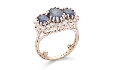 A sapphire and diamond tripple-cluster ring