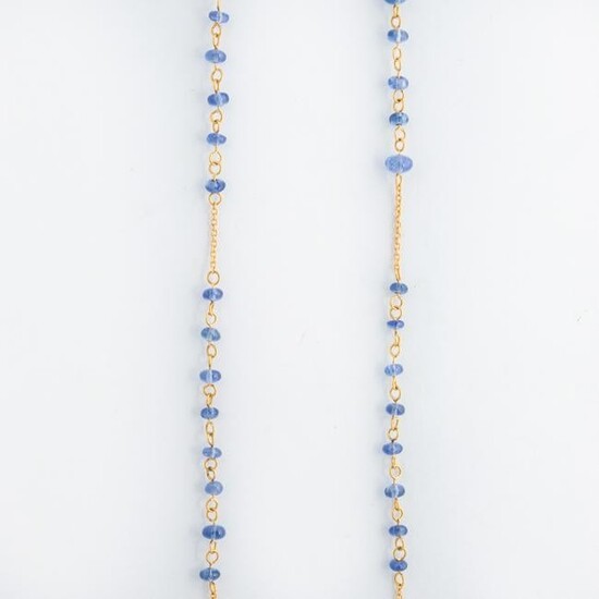 A sapphire and eighteen karat gold necklace