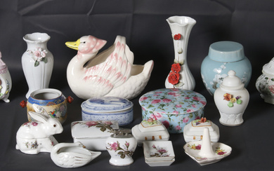 A selection of decorative ceramic trinkets, including a duck-shaped basket,...