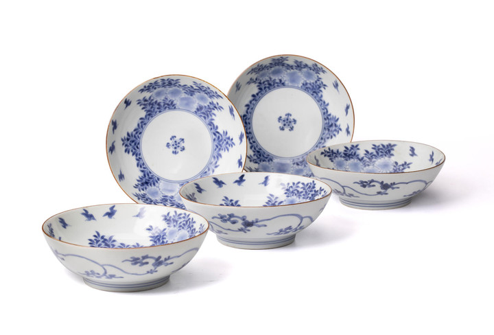 A set of five small porcelain bowls