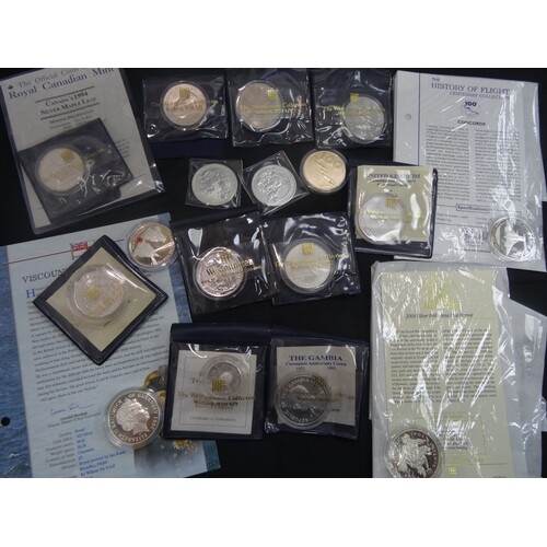A small accumulation of 15 World Crown size coins, including...