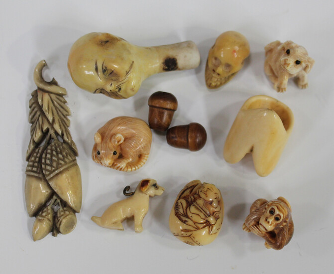 A small group of ivory and bone items, including a Japanese ojime, carved in the form of Daruma in h