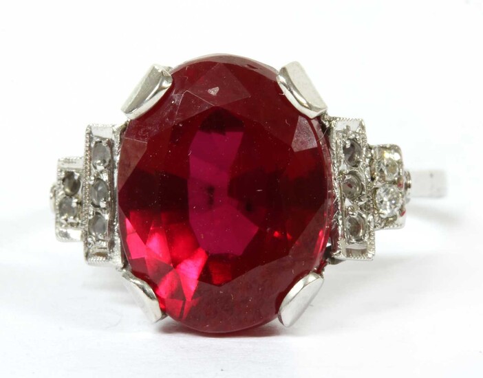 A white gold synthetic ruby and diamond ring