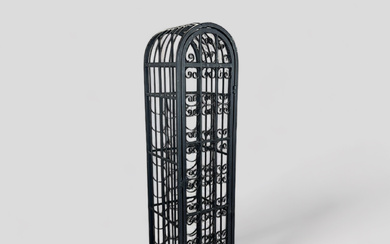 A wine rack, lacquered wrought iron, 20th century.