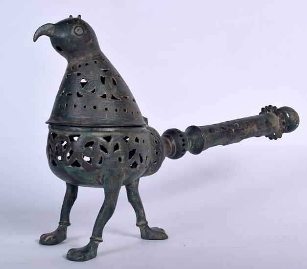 AN ISLAMIC BRONZE INCENSE BURNER, in the form of a