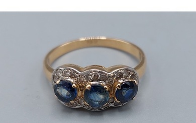 An 18ct gold Diamond and Sapphire triple cluster ring, 3.7gm...