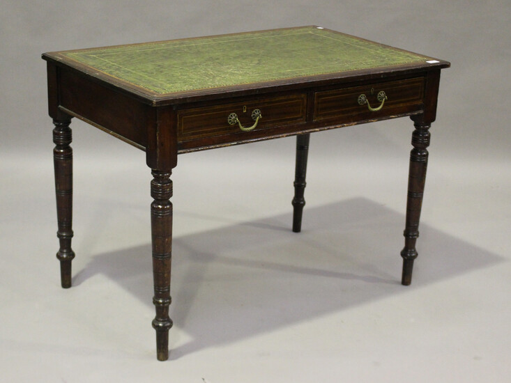 An Edwardian mahogany and crossbanded writing table, the top inset with green leather above two frie
