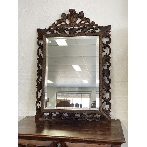 Antique French carved and pierced cushion shaped mirror, app...