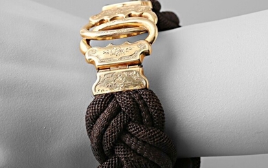 Bracelet en cheveux tressés, fermoir en or... - Lot 97 - Vasari Auction