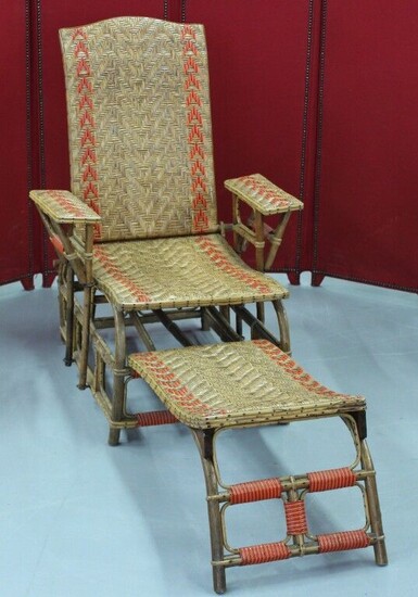 Chaise longue en bambou agrémenté de tressage orange.