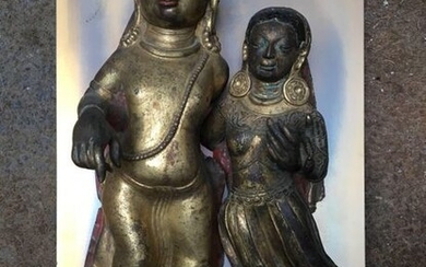 Couple "Shiva-Parvati" in embossed copper. Nepal, 17th century....