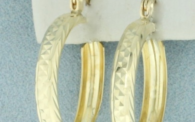 Diamond Cut Hoop Earrings in 14k Yellow Gold
