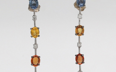 Diamonds and sapphires coloured long earrings.